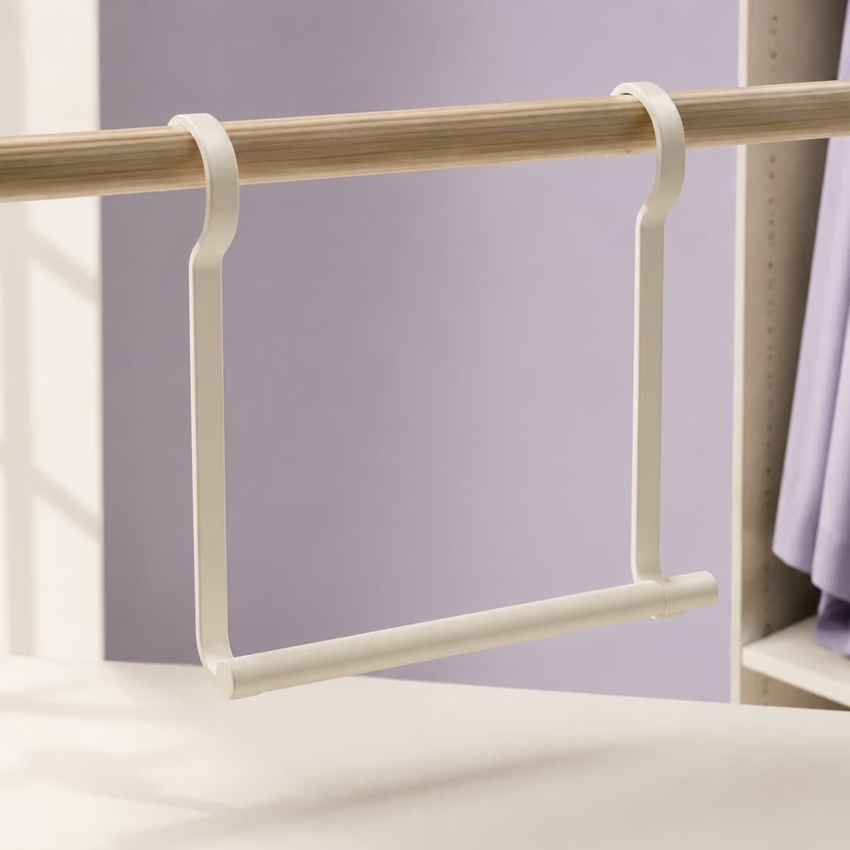 Closet Rod Extender — One rail becomes two. Shirts above, skirts below.