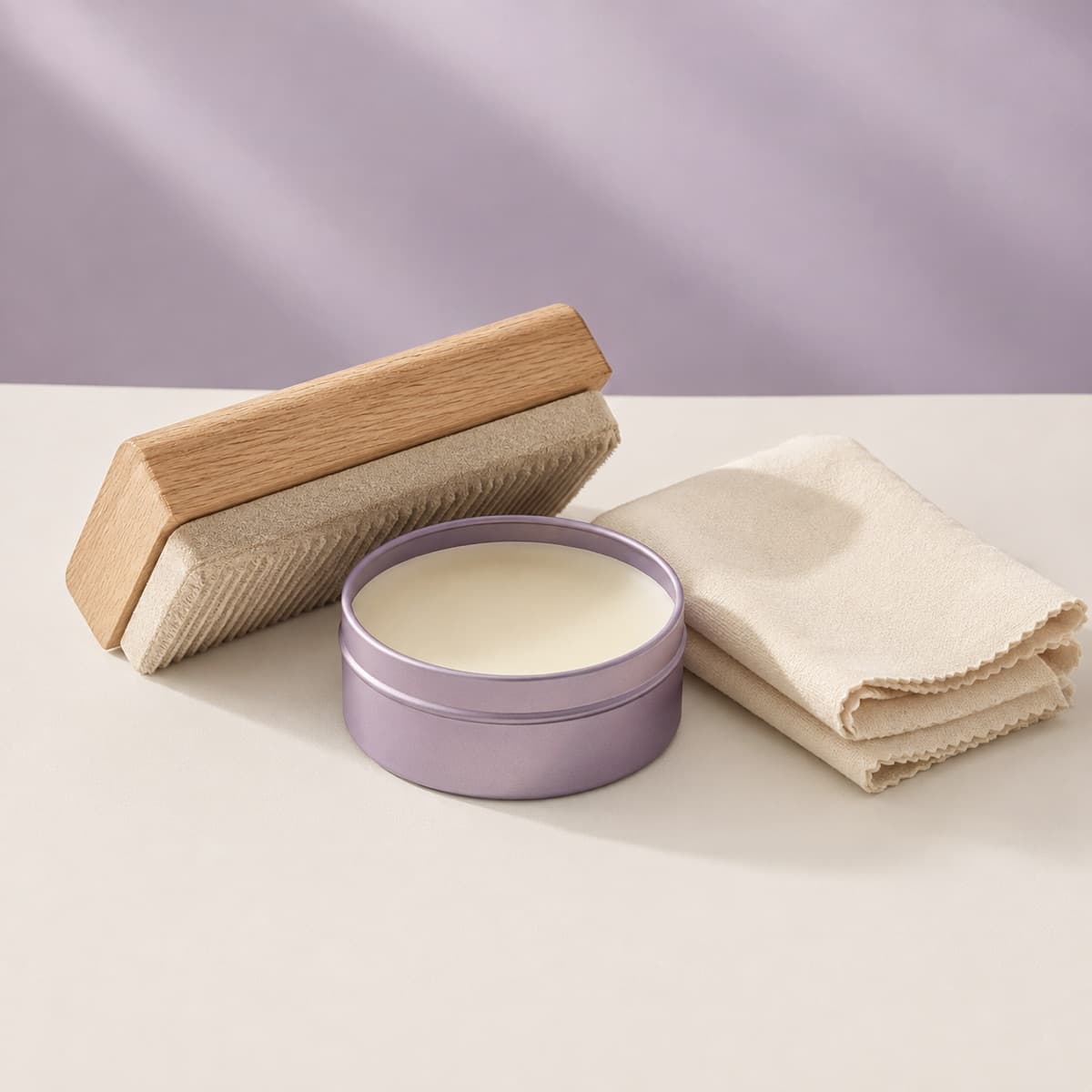 Suede & Leather Care Kit — A crepe brush, a conditioning cream and a cloth. Test before you commit.